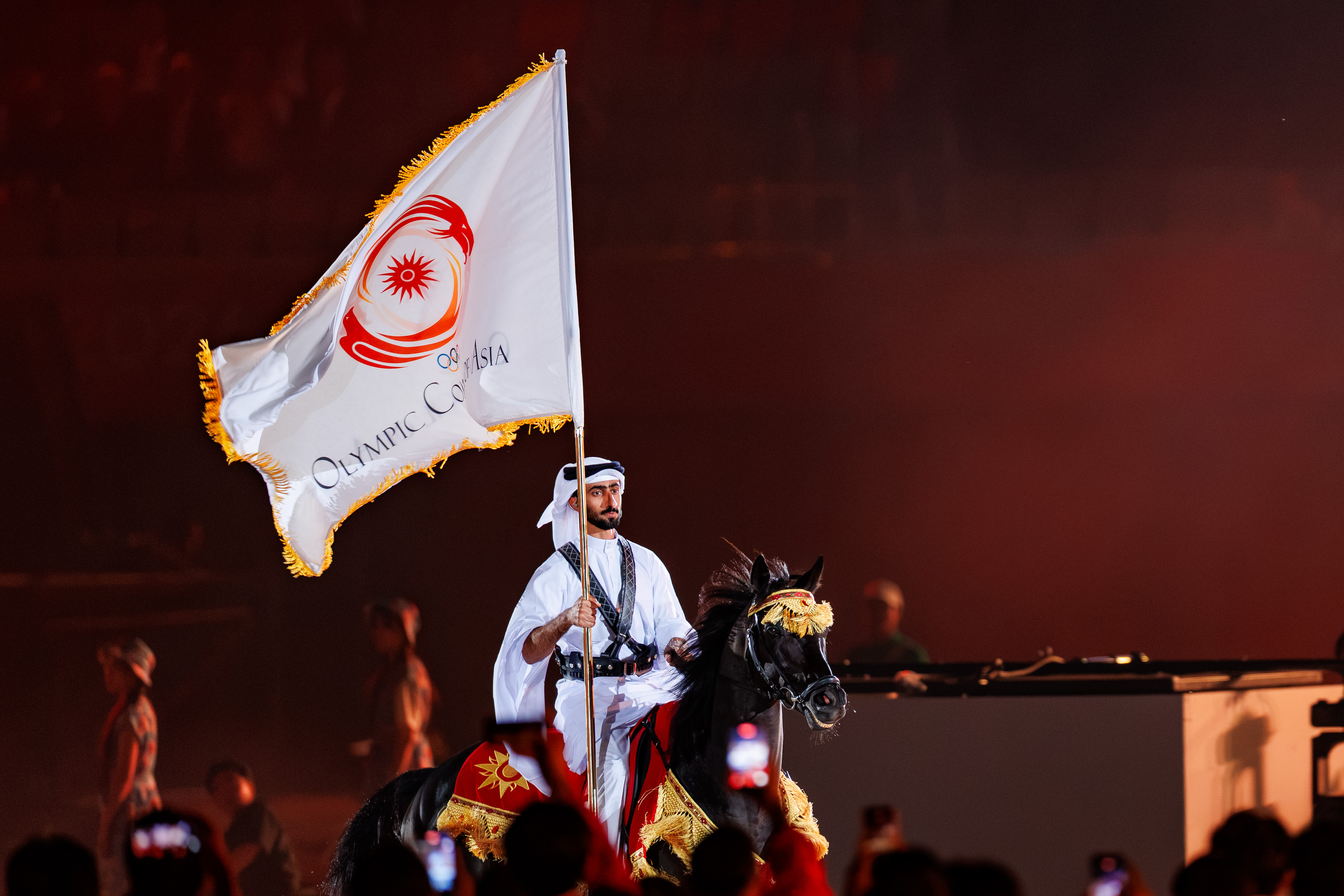 Qatar carrying the flag as it symbolizes the next host .