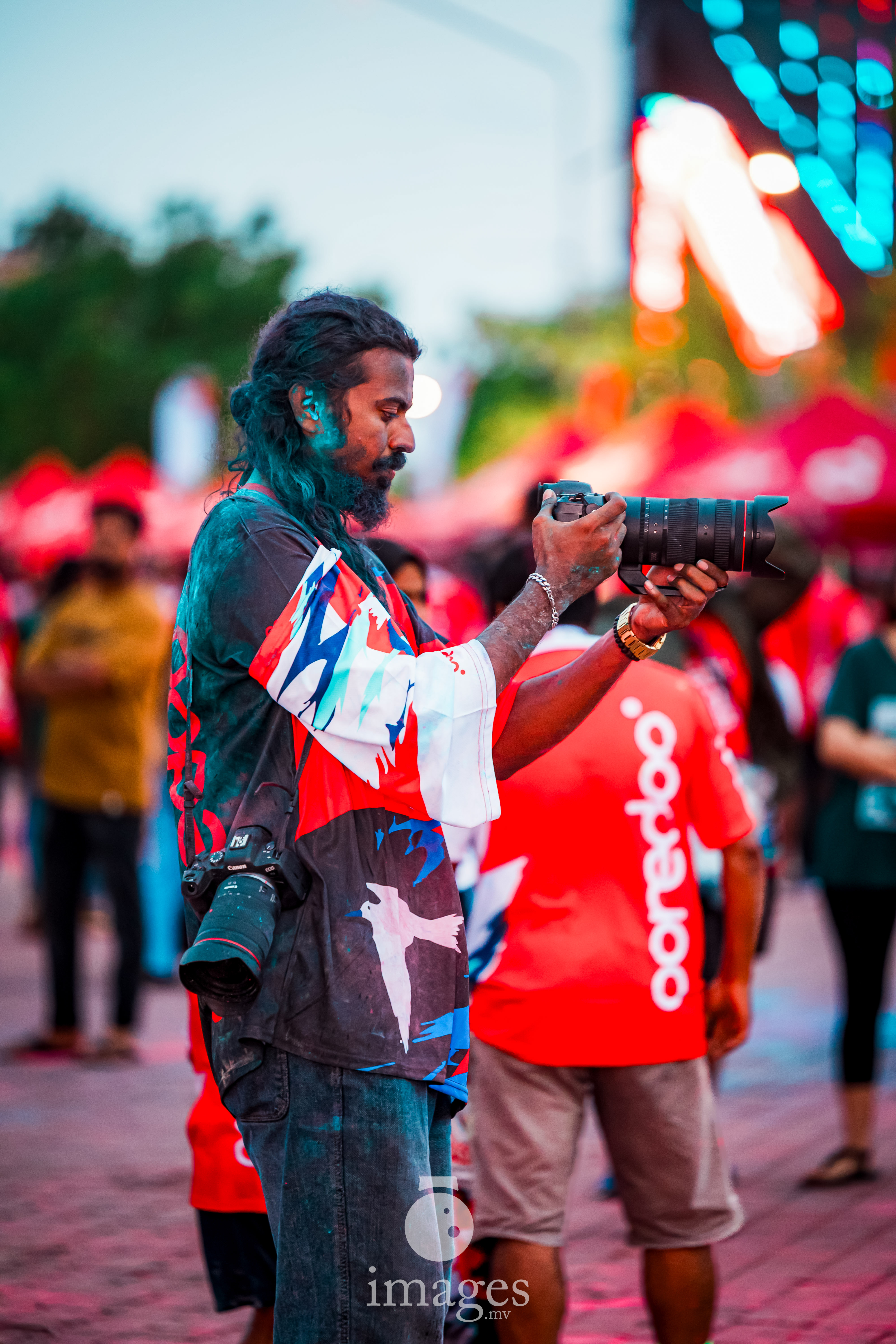 Our Photographers at work — turning seconds into memories.