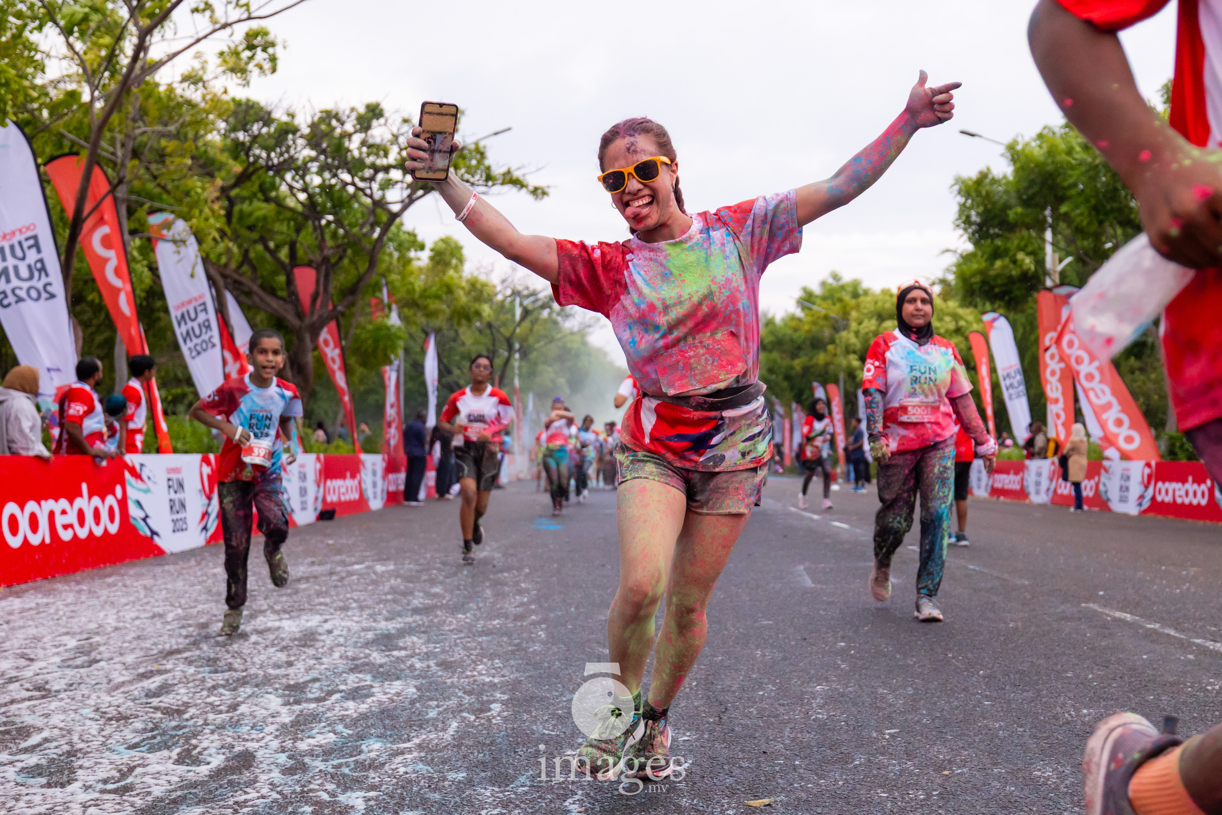 Crossing the finish line with pride written all over the face.