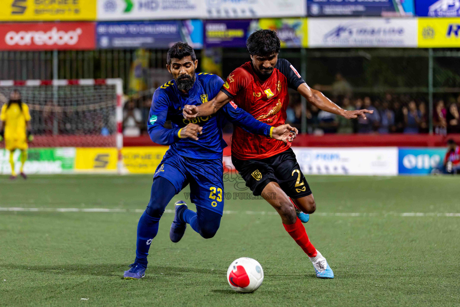 L. Gan VS B. Eydhafushi in the Finals of Golden Futsal Challenge 2024 which was held on Thursday, 7th March 2024, in Hulhumale', Maldives. 
Photos: Hassan Simah / images.mv