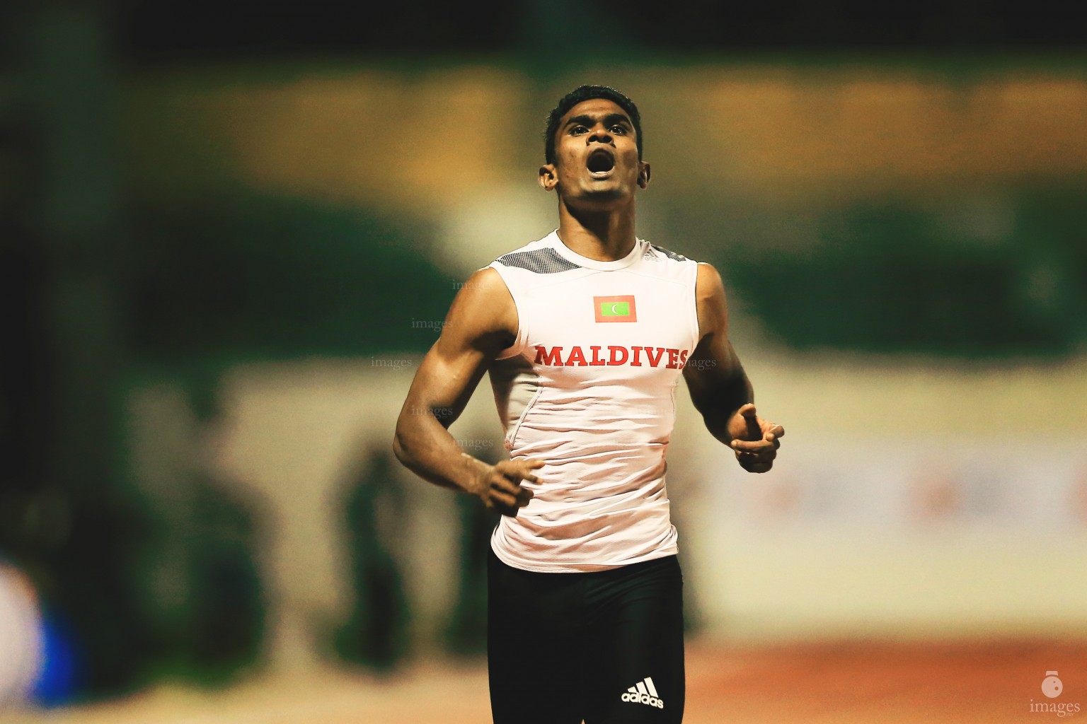 Hassan Said celebrates after finishing second in the 200m finals in Indian Ocean Island Games, La Reunion, Tuesday, August. 4, 2015.  (Images.mv Photo/ Hussain Sinan).
