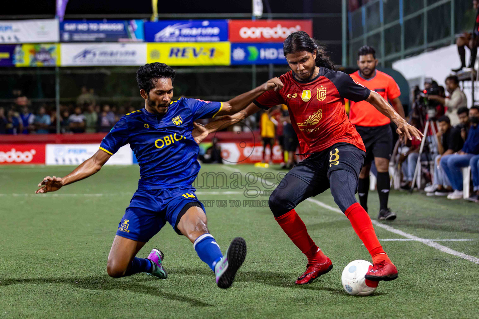 L. Gan VS B. Eydhafushi in the Finals of Golden Futsal Challenge 2024 which was held on Thursday, 7th March 2024, in Hulhumale', Maldives. 
Photos: Hassan Simah / images.mv