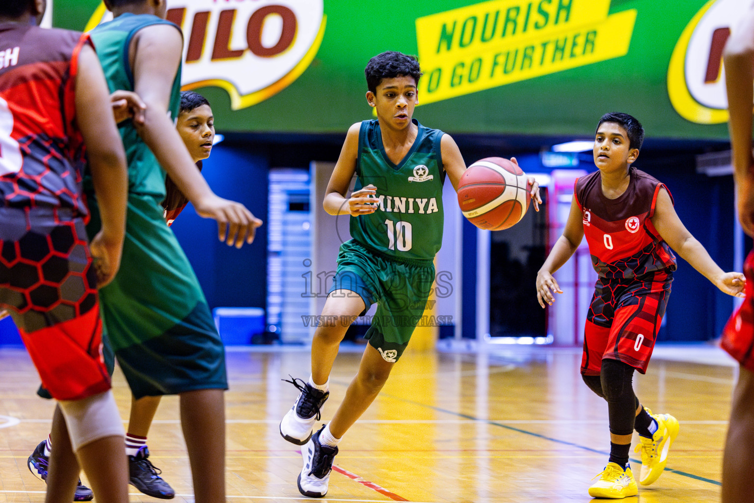 Aminiyya School vs Iskandhar School in day 26 of Junior Basketball Championship 2024 was held in Social Center, Male', Maldives on Tuesday, 10th December 2024. Photos: Nausham Waheed / images.mv