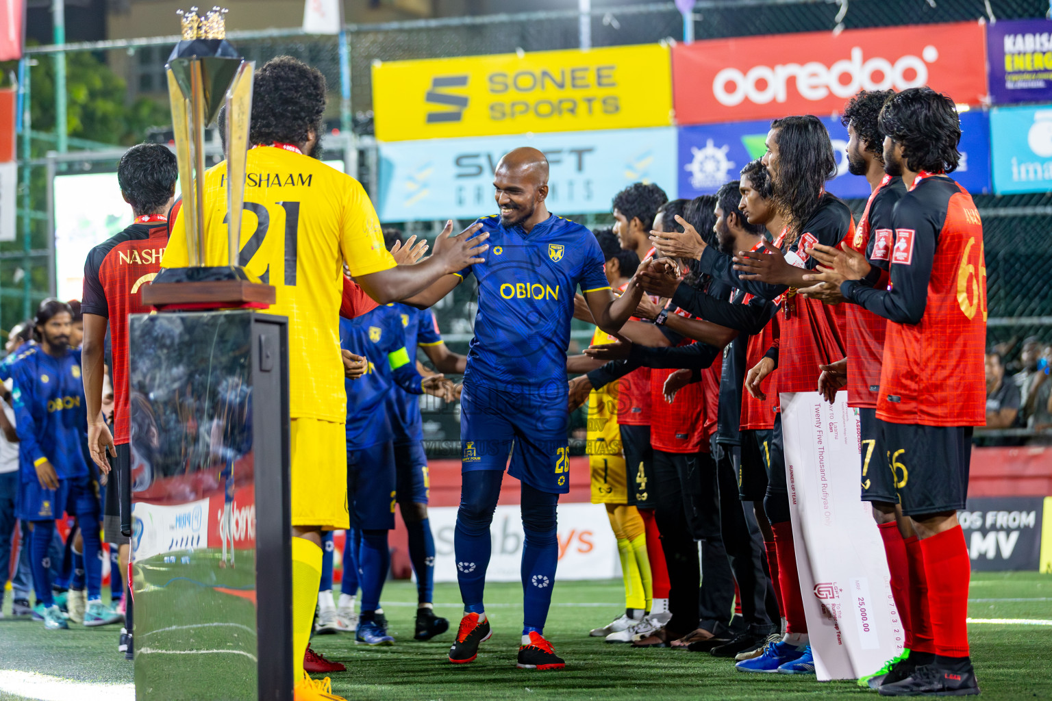 L. Gan VS B. Eydhafushi in the Finals of Golden Futsal Challenge 2024 which was held on Thursday, 7th March 2024, in Hulhumale', Maldives. 
Photos: Hassan Simah / images.mv