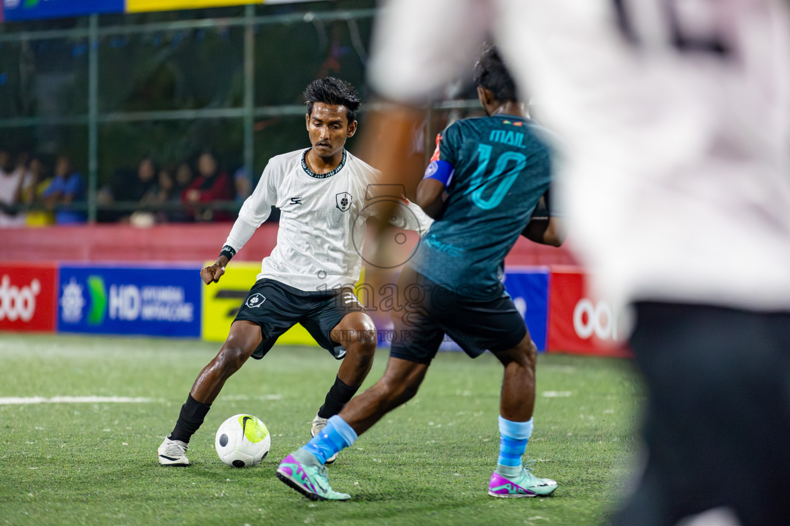 L. Isdhoo VS L. Gan on Day 33 of Golden Futsal Challenge 2024, held on Sunday, 18th February 2024, in Hulhumale', Maldives Photos: Hassan Simah / images.mv