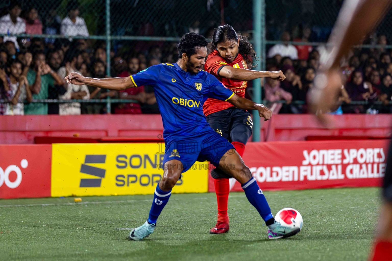 L. Gan VS B. Eydhafushi in the Finals of Golden Futsal Challenge 2024 which was held on Thursday, 7th March 2024, in Hulhumale', Maldives. 
Photos: Hassan Simah / images.mv