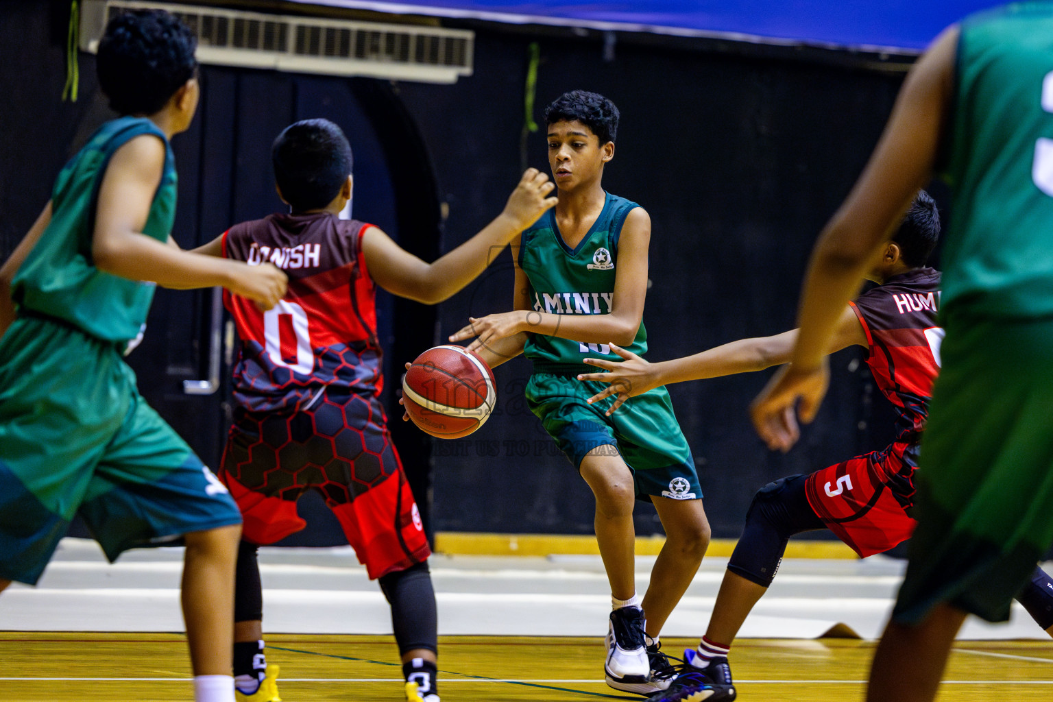 Aminiyya School vs Iskandhar School in day 26 of Junior Basketball Championship 2024 was held in Social Center, Male', Maldives on Tuesday, 10th December 2024. Photos: Nausham Waheed / images.mv