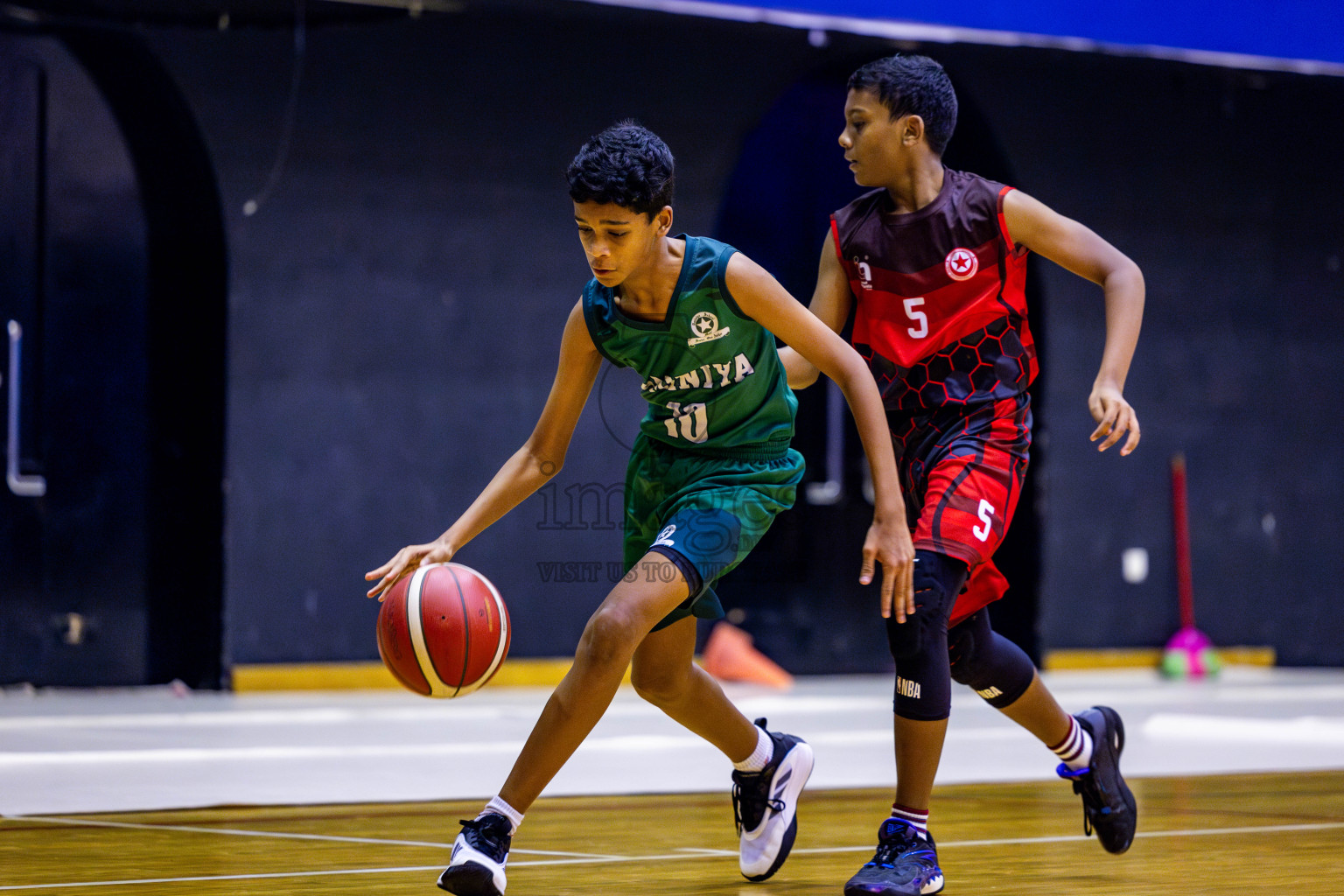 Aminiyya School vs Iskandhar School in day 26 of Junior Basketball Championship 2024 was held in Social Center, Male', Maldives on Tuesday, 10th December 2024. Photos: Nausham Waheed / images.mv