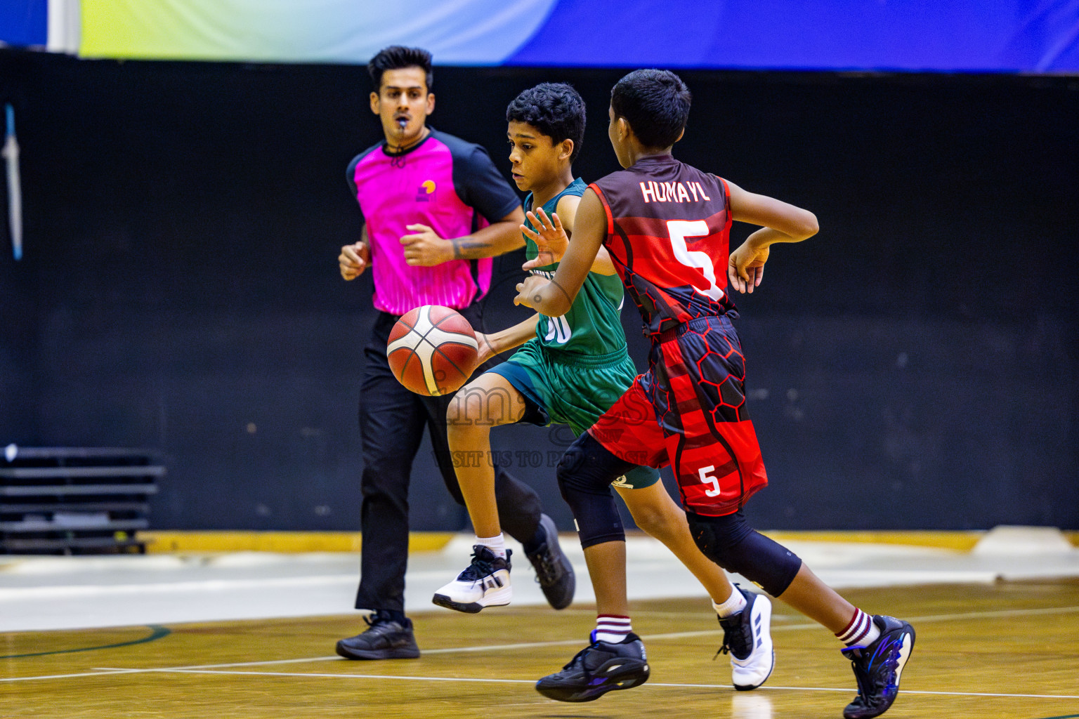 Aminiyya School vs Iskandhar School in day 26 of Junior Basketball Championship 2024 was held in Social Center, Male', Maldives on Tuesday, 10th December 2024. Photos: Nausham Waheed / images.mv