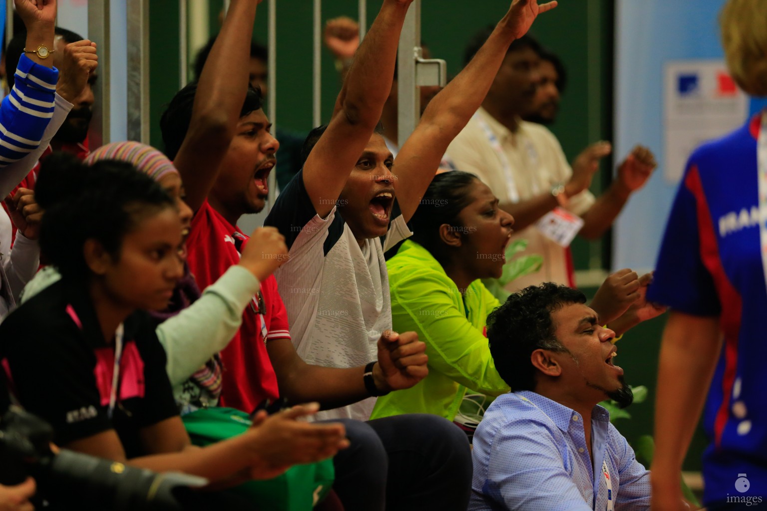 Maldivian players and officials reacts after Mueena Mohamed (unseen) wins a point in the semifinals in Indian Ocean Island Games, La Reunion, Friday, August. 7, 2015.  (Images.mv Photo/ Hussain Sinan).