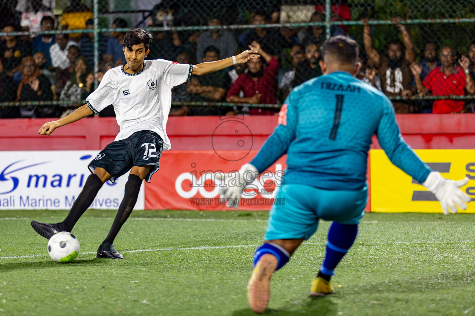 R. Dhuvaafaru VS Sh. Feydhoo on Day 33 of Golden Futsal Challenge 2024, held on Sunday, 18th February 2024, in Hulhumale', Maldives Photos: Hassan Simah / images.mv