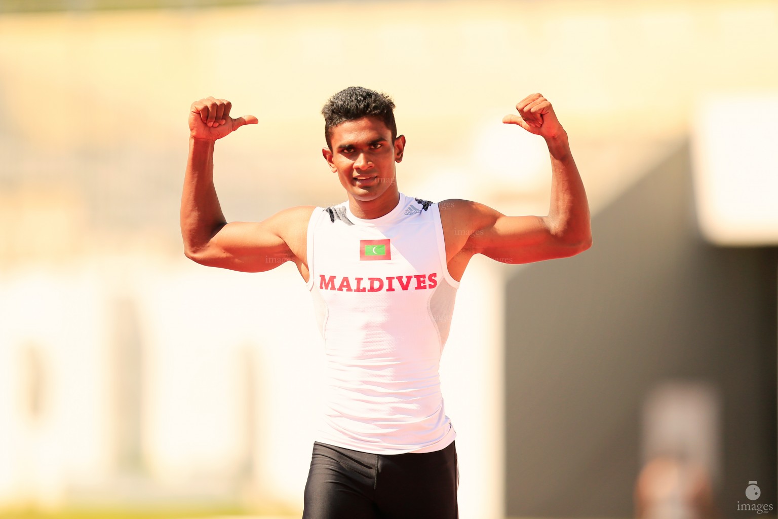 Hassan Said celebrates after finishing first in the 100m heats in Indian Ocean Island Games, La Reunion, Sunday, August. 2, 2015.  (Images.mv Photo/ Hussain Sinan).