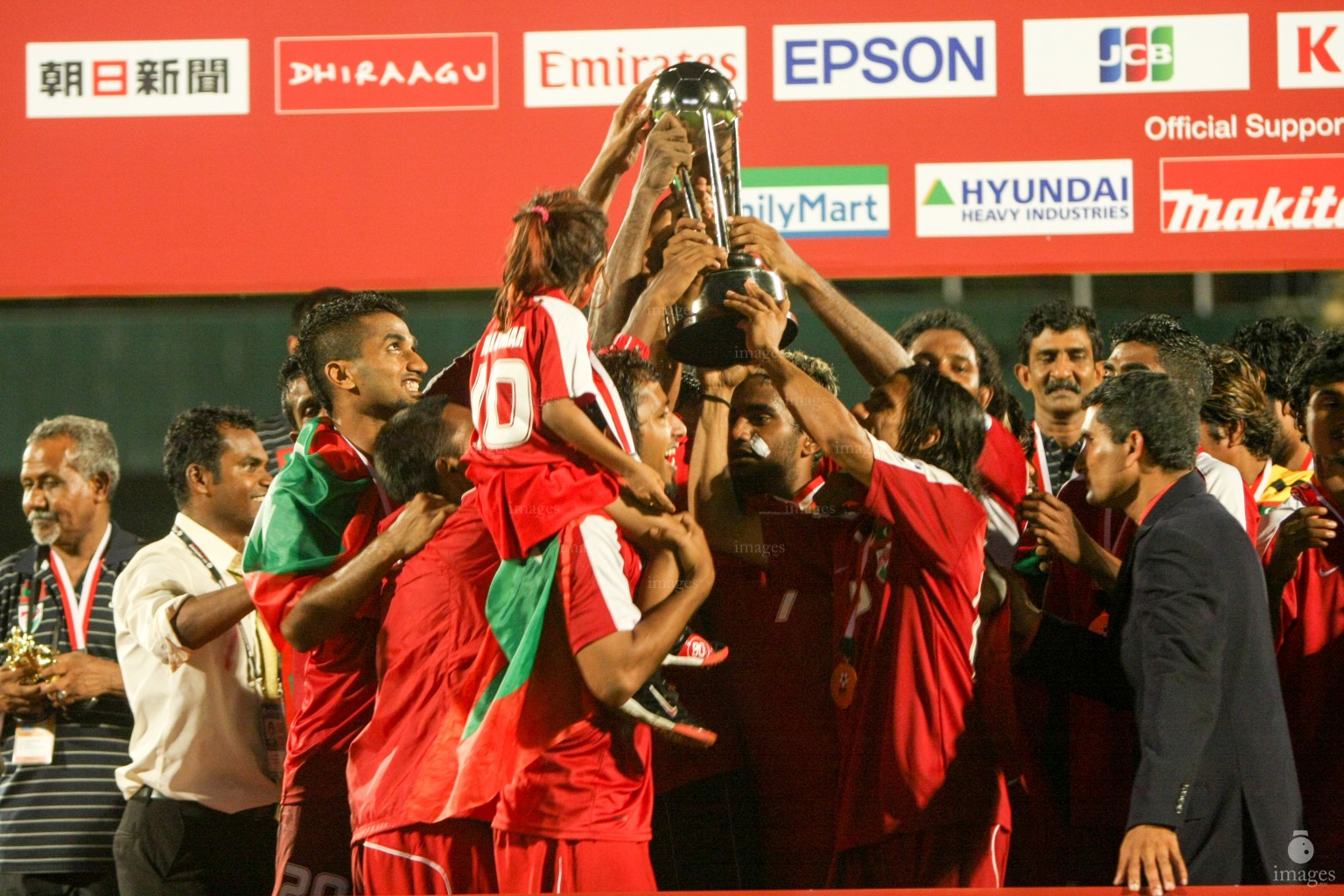 Maldivian players and officials celebrate wafter winning the SAFF Championship, Saturday, June. 14, 2008  (Archived  Photo/ Hussain Sinan).