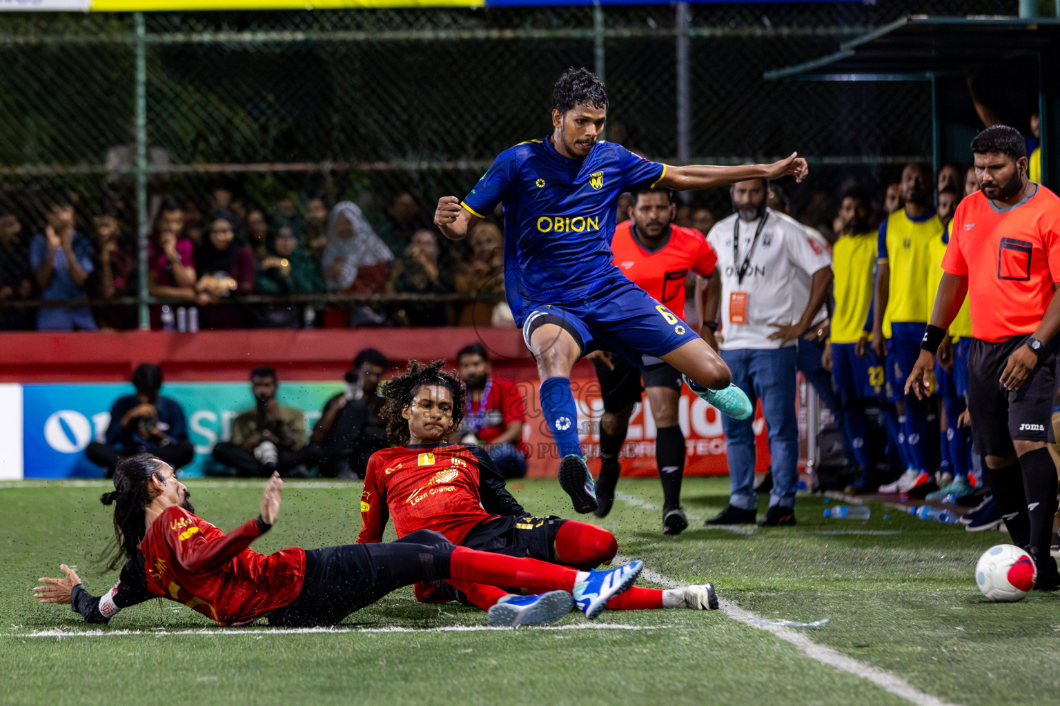 L. Gan VS B. Eydhafushi in the Finals of Golden Futsal Challenge 2024 which was held on Thursday, 7th March 2024, in Hulhumale', Maldives. 
Photos: Hassan Simah / images.mv