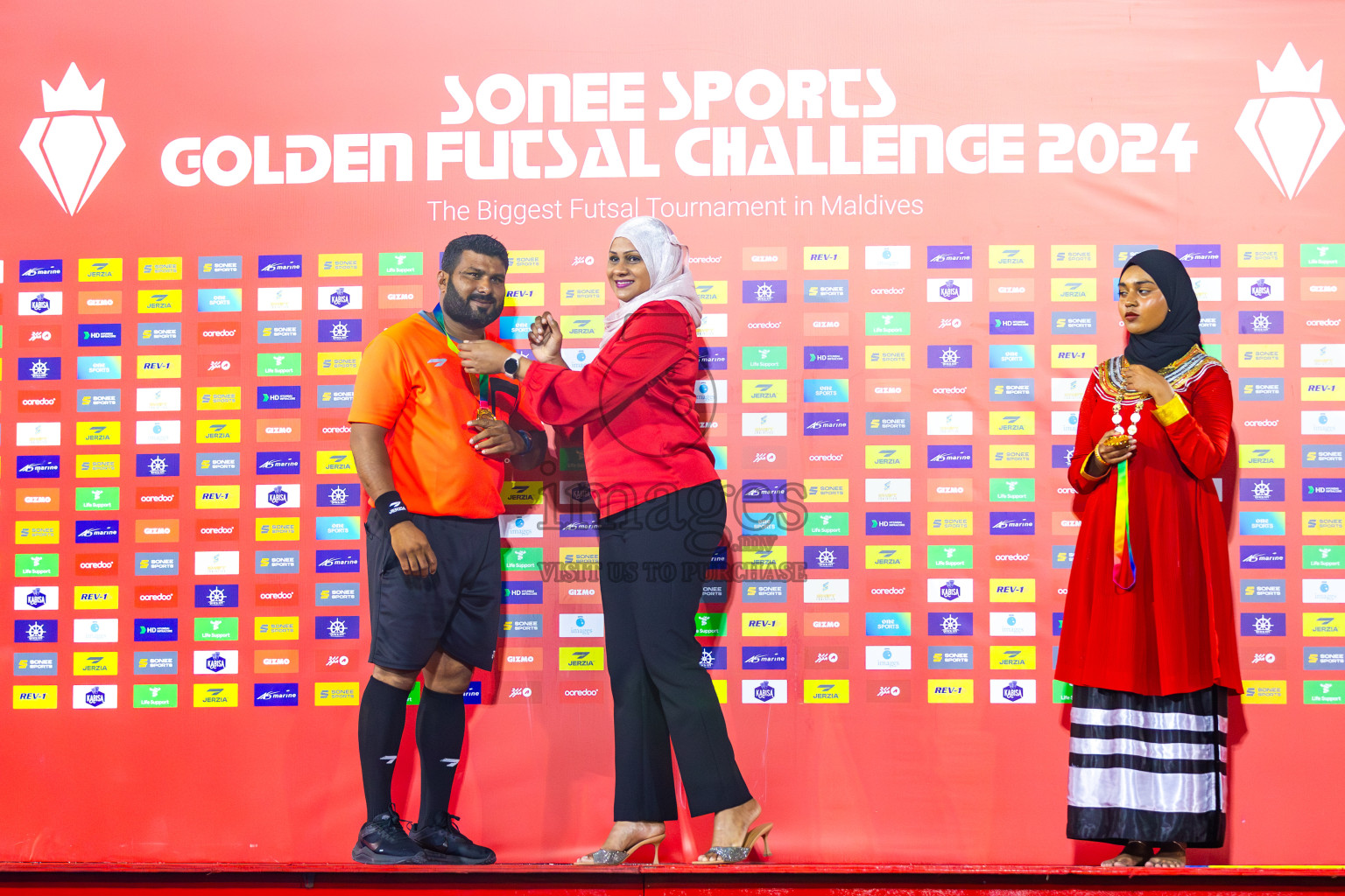 L. Gan VS B. Eydhafushi in the Finals of Golden Futsal Challenge 2024 which was held on Thursday, 7th March 2024, in Hulhumale', Maldives. 
Photos: Hassan Simah / images.mv