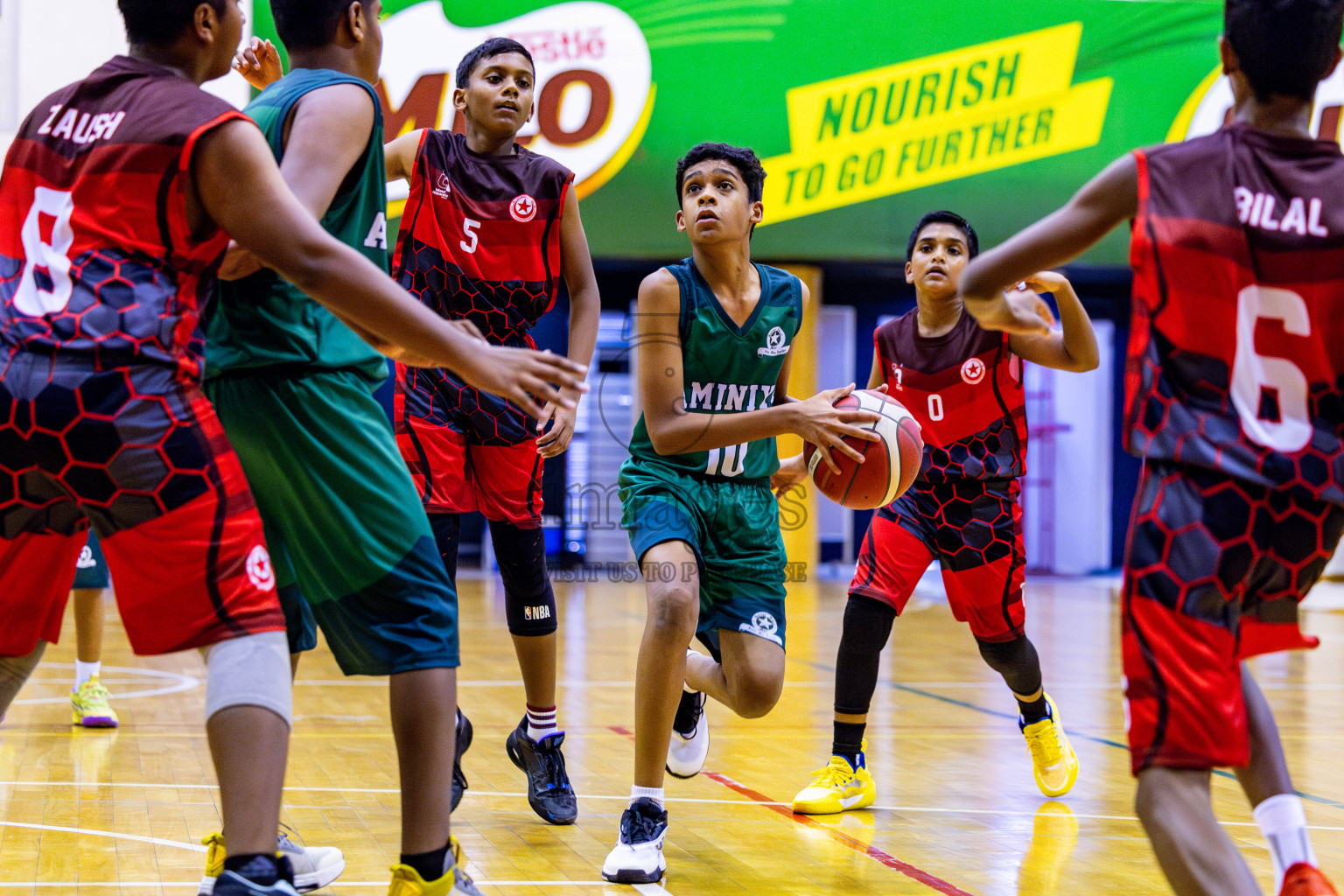 Aminiyya School vs Iskandhar School in day 26 of Junior Basketball Championship 2024 was held in Social Center, Male', Maldives on Tuesday, 10th December 2024. Photos: Nausham Waheed / images.mv