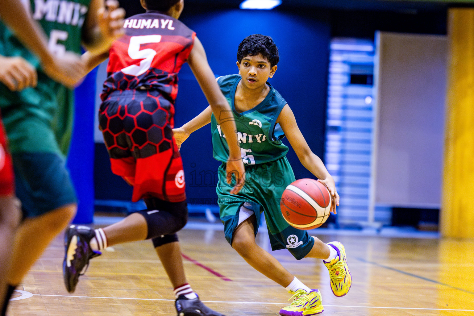 Aminiyya School vs Iskandhar School in day 26 of Junior Basketball Championship 2024 was held in Social Center, Male', Maldives on Tuesday, 10th December 2024. Photos: Nausham Waheed / images.mv