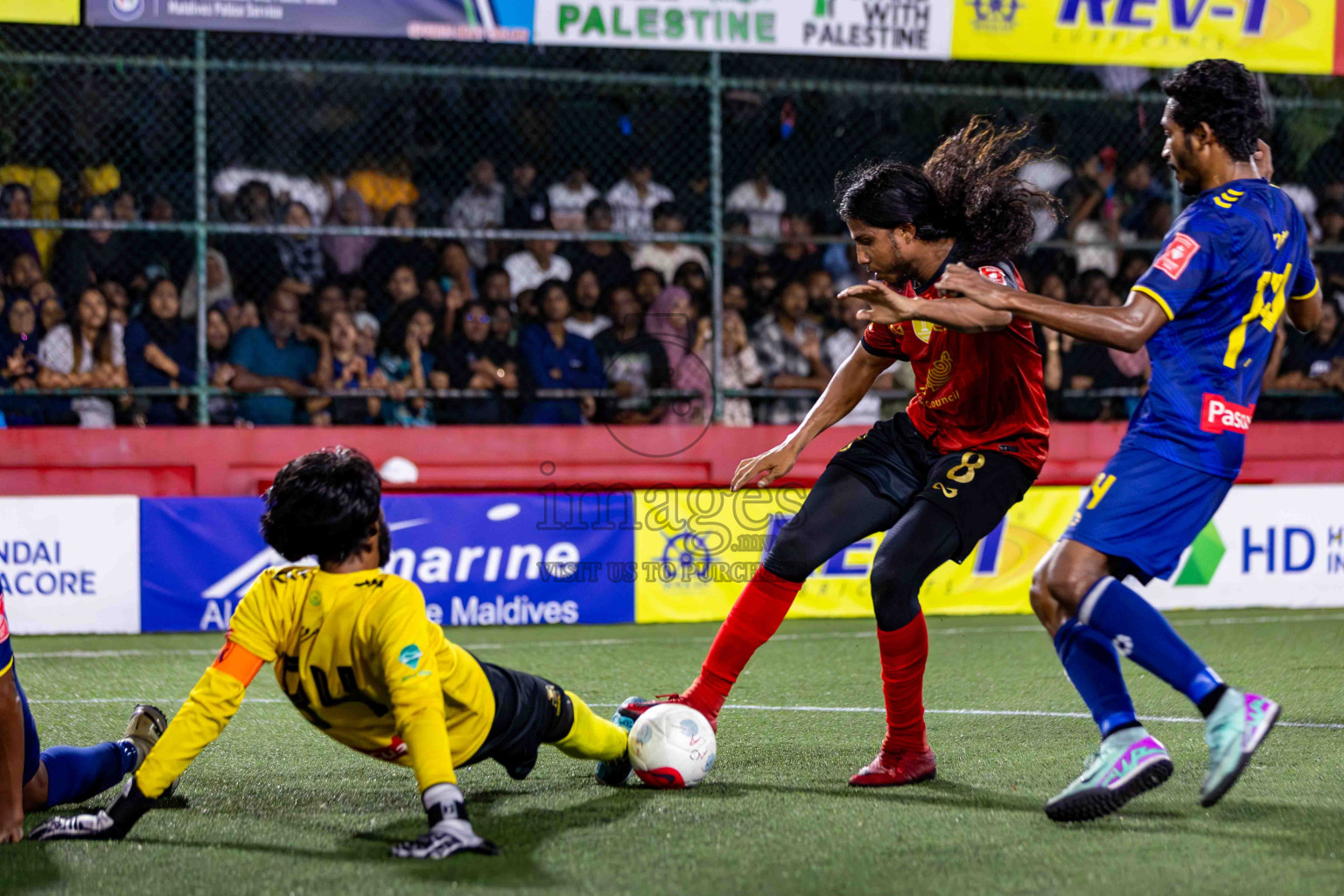 L. Gan VS B. Eydhafushi in the Finals of Golden Futsal Challenge 2024 which was held on Thursday, 7th March 2024, in Hulhumale', Maldives. 
Photos: Hassan Simah / images.mv