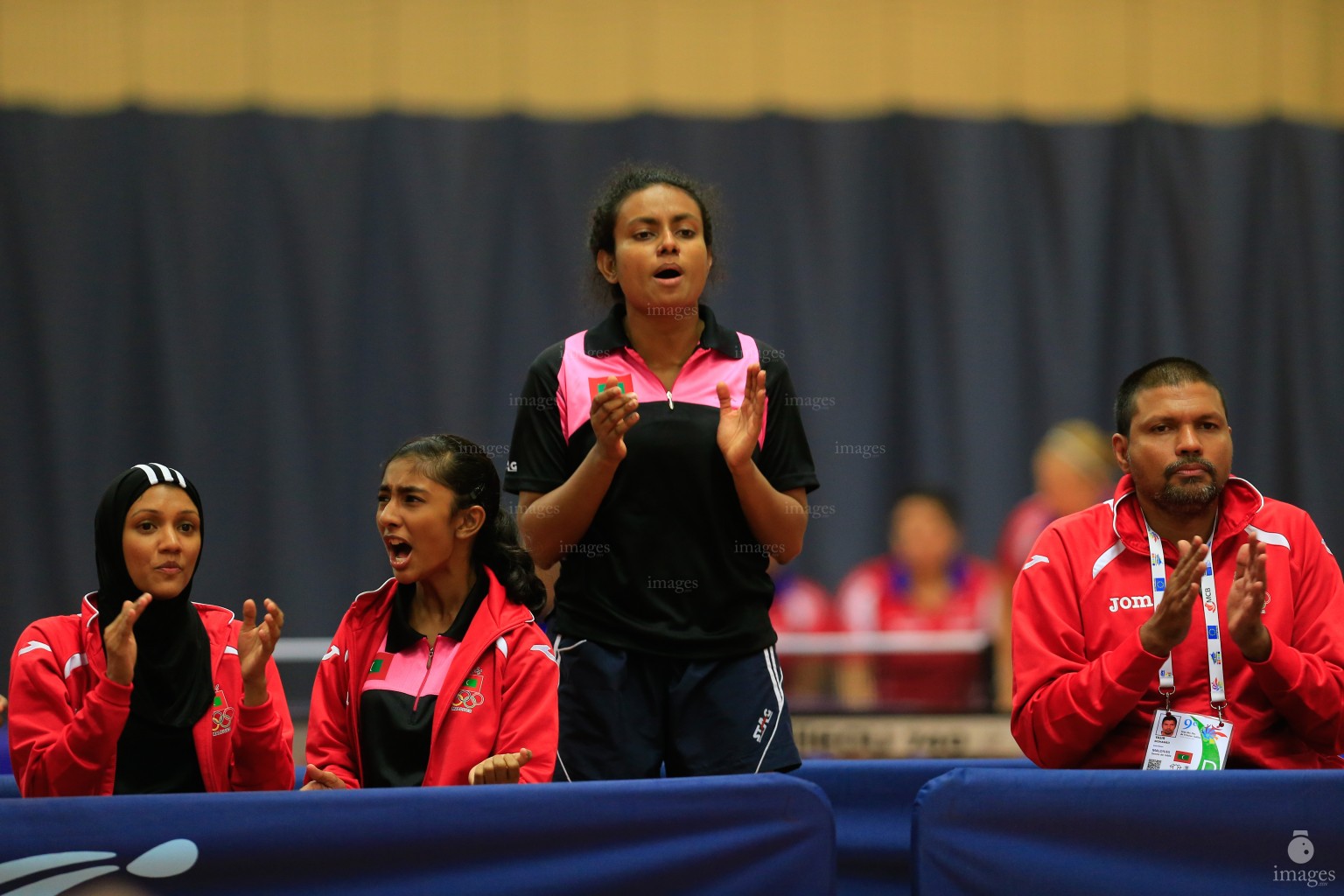 Maldives TT team reacts after Mueena Mohamed (unseen) wins a point in the semifinals in Indian Ocean Island Games, La Reunion, Friday, August. 7, 2015.  (Images.mv Photo/ Hussain Sinan).