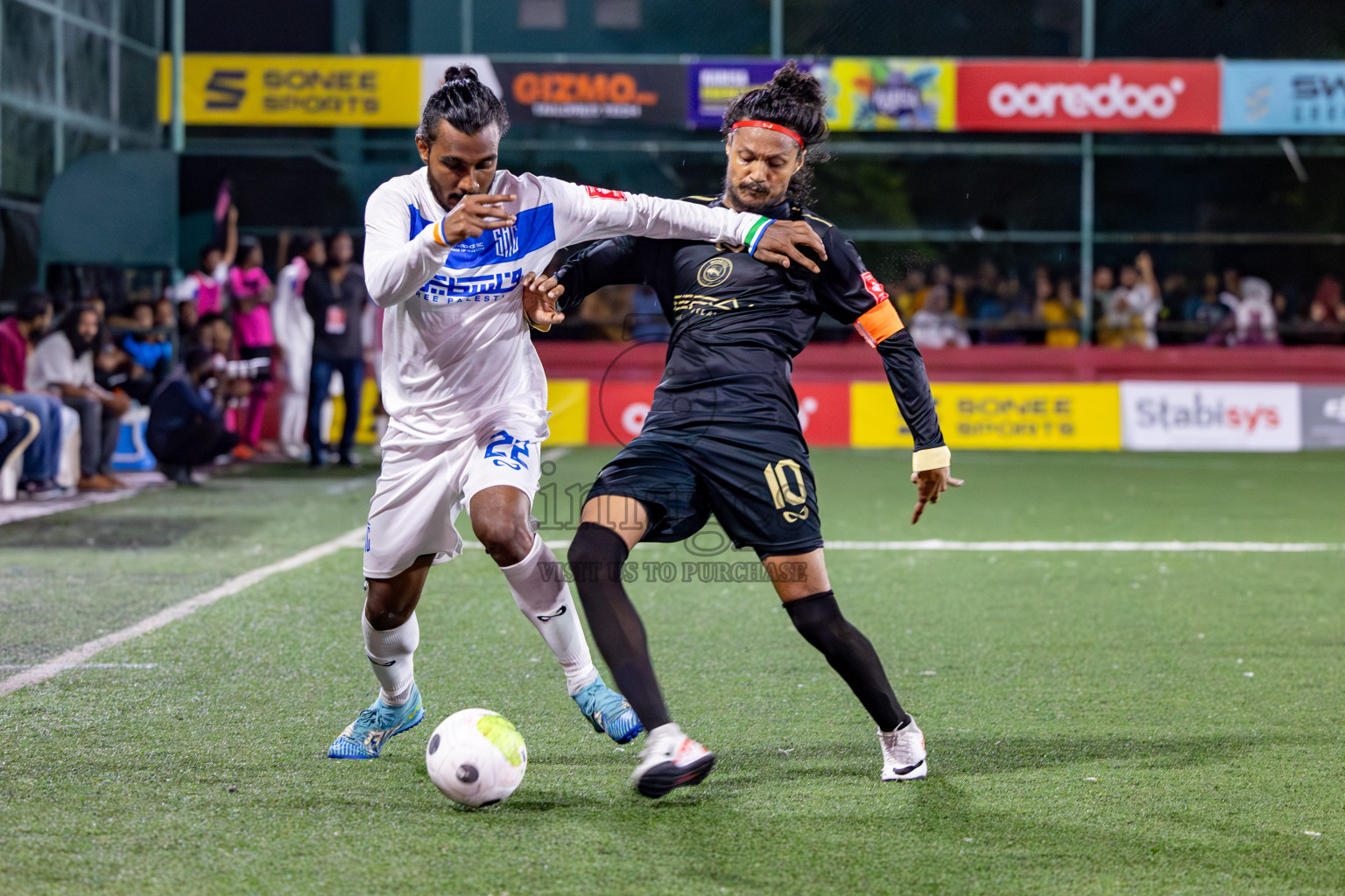 S. Hithadhoo VS ADh. Maamigili in Round of 16 on Day 40 of Golden Futsal Challenge 2024 which was held on Tuesday, 27th February 2024, in Hulhumale', Maldives Photos: Hassan Simah / images.mv