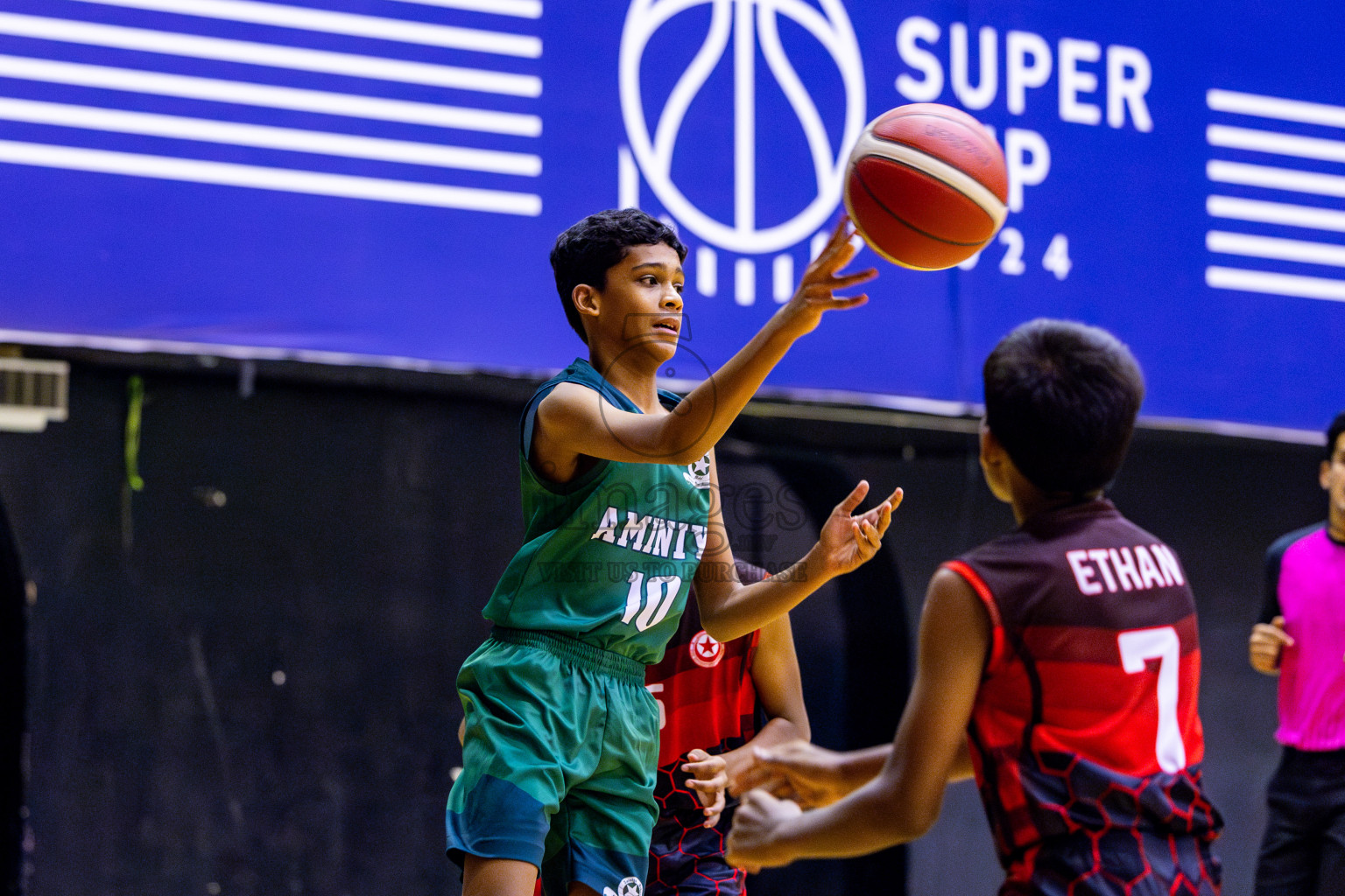 Aminiyya School vs Iskandhar School in day 26 of Junior Basketball Championship 2024 was held in Social Center, Male', Maldives on Tuesday, 10th December 2024. Photos: Nausham Waheed / images.mv