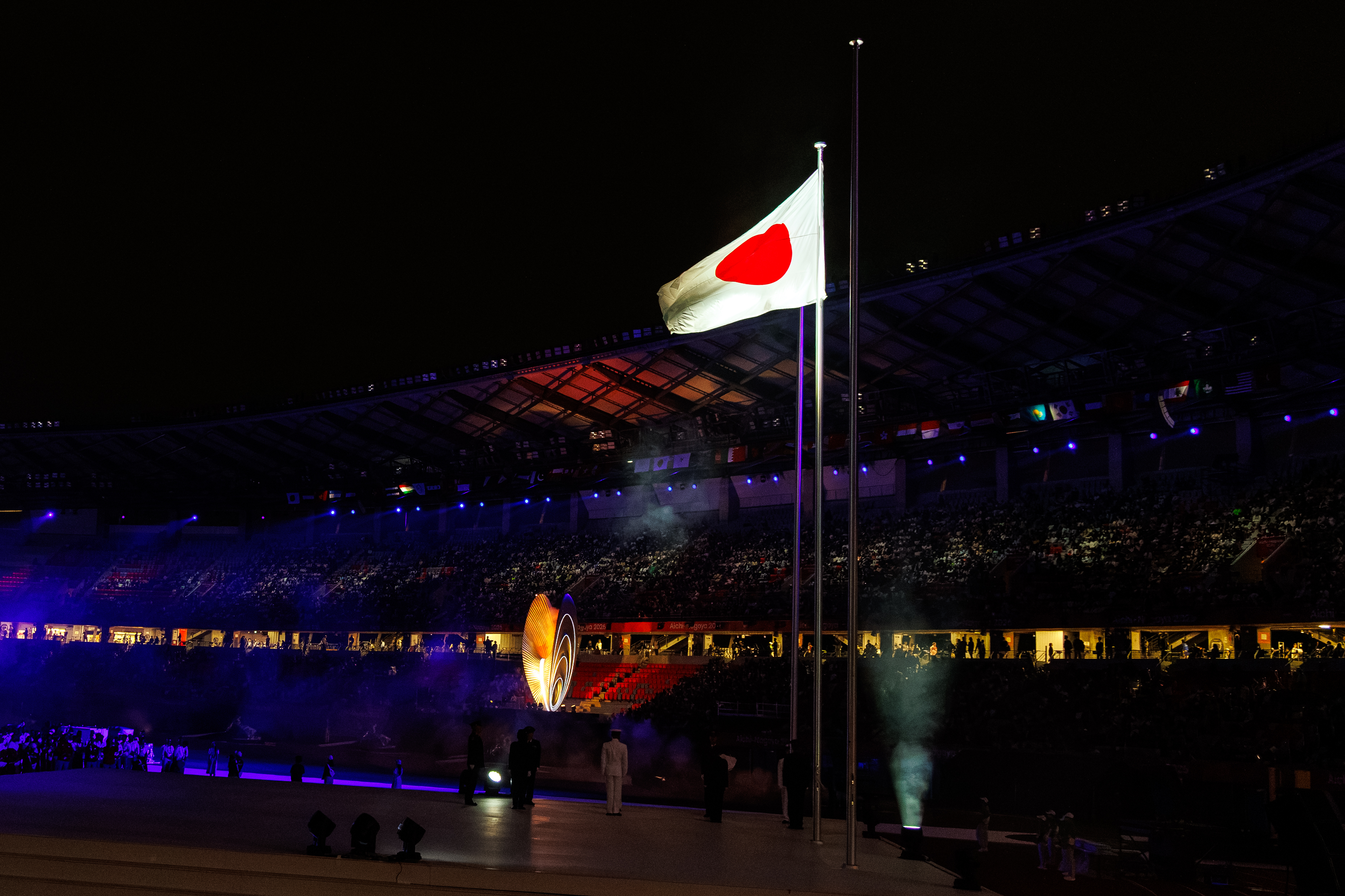 Host Nation's flag, at the closing ceremony